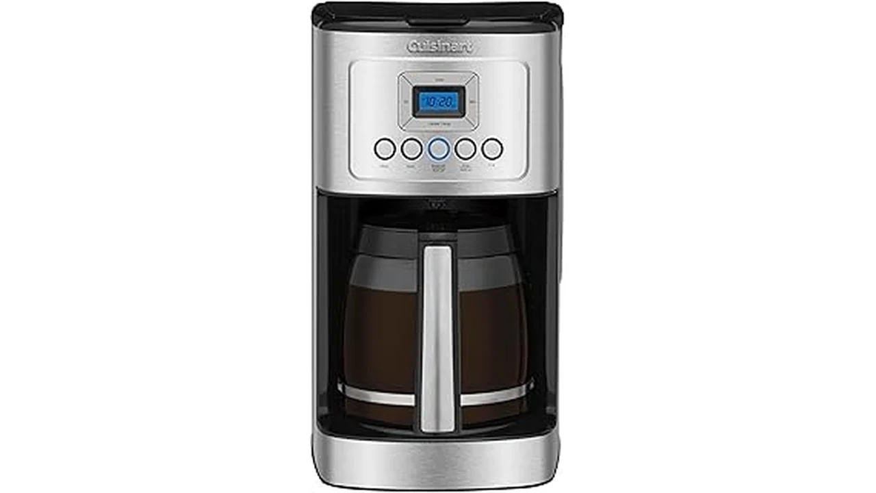 The image shows a stylish, modern coffee maker sitting on a kitchen counter, suggesting top-rated quality.